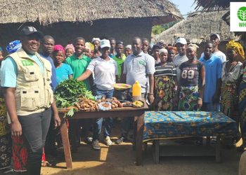 Hawa Bockarie (In WHH Field Gear from left), WHH Field Staff and project participants in Njaluahun Community in preparation for the Cooking Class.
