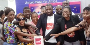 Customer Service Week…  UBA SL Cuts Cake with its Customers