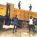 Caption: Sand miners loading a Ten-Tire Truck at John Obey