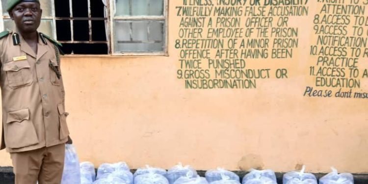 Current and Former Parliamentary Staff Chernor Sulaiman Bah and Mohamed Kargbo Donates Water to Makeni Correctional Center