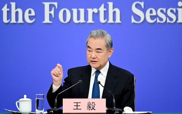Member of the Political Bureau of the CPC Central Committee and Foreign Minister Wang Yi Meets the Press